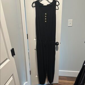 Black Sleeveless Jumpsuit with Button Detail